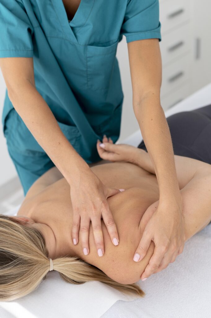 physiotherapist-giving-massage-her-patient-clinic
